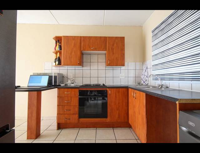 1 BEDROOM APARTMENT FOR SALE IN ROOIHUISKRAAL NORTH